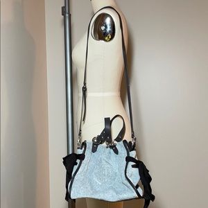 Velour and leather handbag